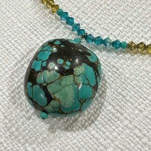 Turquoise and crystal bead necklace.